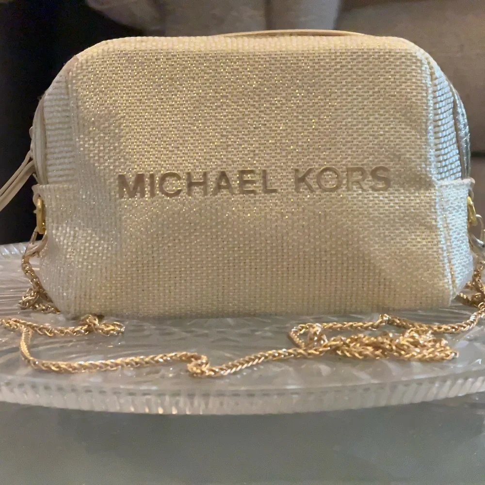 Michael Kors Shimmering Cream Gold Pouch with golden sling